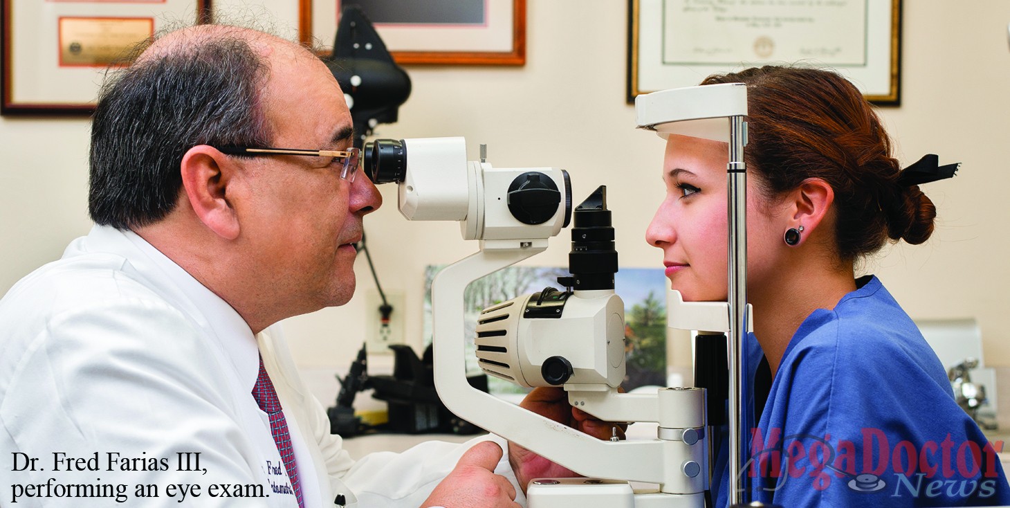 Dr. Fred Farias II of 20/20 Vision Care performing an eye exam. 