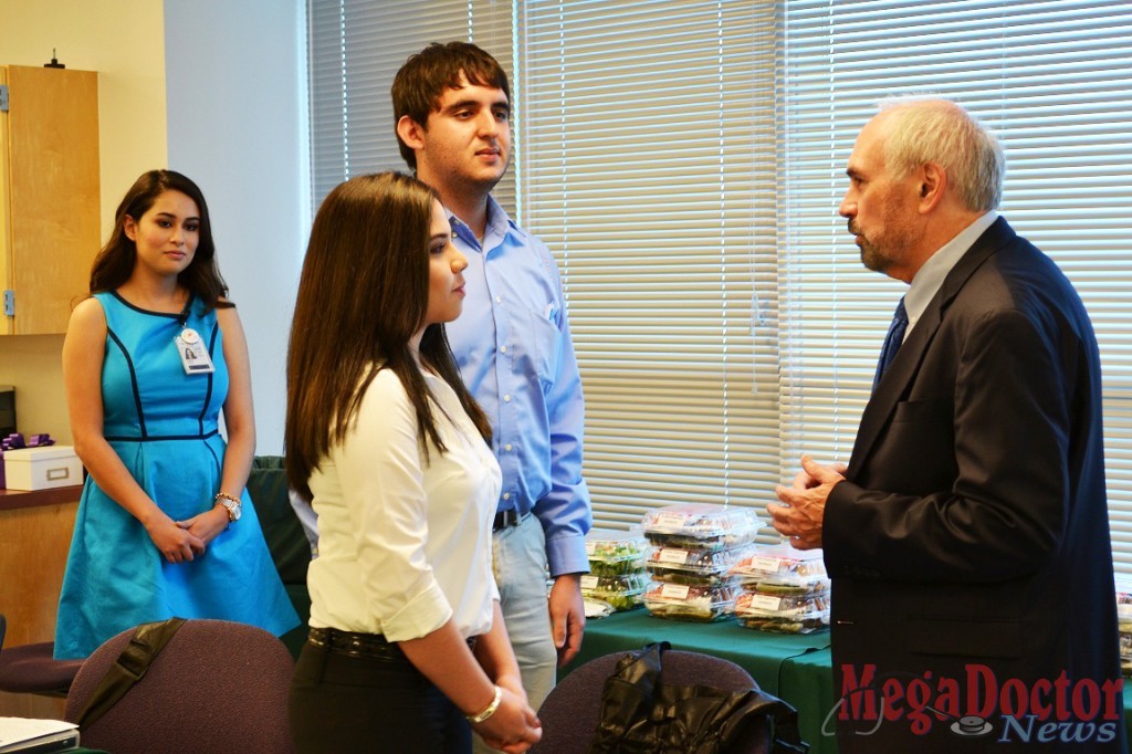 UTRGV President Dr. Guy Bailey speaks to STC dual enrollment DEMSA students Tania Vargas and Marco Cruz at the STC Nursing & Allied Health Campus in McAllen.