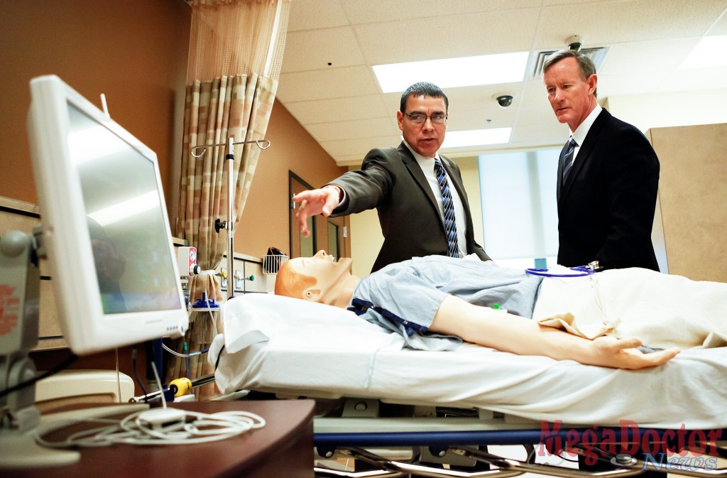 Dean Leonel Vela takes UT System Chancellor William McRaven on a tour of the UTRGV simulation hospital at the Harlingen RAHC in January 2015.