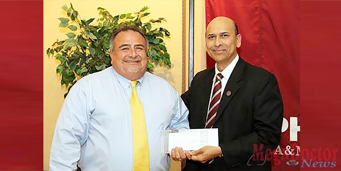 Gavino “Gabby” Garza, R.Ph., director of pharmacy at Doctors Hospital at Renaissance, receives the Preceptor of the Year Award from Indra K. Reddy, Ph.D., professor and founding dean, on May 20th at the College Awards Banquet at the Texas A&M Health Science Center Irma Lerma Rangel College of Pharmacy. 