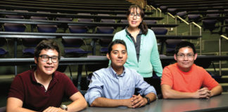 A team of four UTRGV mechanical engineering students have designed a prototype device that will help Parkinson’s disease victims right legibly again. The development of their Self-Stabilization Holder, a yearlong endeavor which became their senior design project, was overseen by Dr. Karen Lozano, professor of mechanical engineering (standing). This spring the device placed second in the Rafael Munguia UTRGV Business Plan Competition overseen by the Robert C. Vackar College of Business & Entrepreneurship. The students (left to right) are Carlos Hernandez, Misael Martinez, and Rodolfo Becerra. Team member Arnoldo Ventura, currently participating in an out-of-state internship, is not pictured. (UTRGV Photo by Paul Chouy)