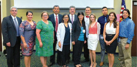 The UTRGV School of Medicine held a reception to welcome the inaugural cohort of medical residents for its Family Practice Residency Program with Knapp Medical Center. From left are Dr. Rene Lopez, CEO of Knapp Medical Center; Alexandra Smith, program coordinator for the Knapp Medical Center/UTRGV Family Practice Residency Program; Dr. Yolanda Gomez, associate dean for Graduate Medical Education, UTRGV School of Medicine; Dr. Miguel Sanchez Rivas, medical resident; Dr. Rosemary Recavarren, chief medical staff, Knapp Medical Center; Dr. Steven Lieberman, interim dean, UTRGV School of Medicine; medical residents Dr. Carolina Gomez De Ziegler, Dr. Eddy Berges, Dr. Eliana Costantino-Burgazzi, Dr. Diego Moreno Dr. Marita Sanchez Sierra Marino; and Dr. Miguel Tello, incoming chief of staff for Knapp Medical Center, associate director of the Knapp Family Practice Residency Program and associate professor in the UTRGV School of Medicine Department of Family Medicine. (UTRGV Photo by Paul Chouy)