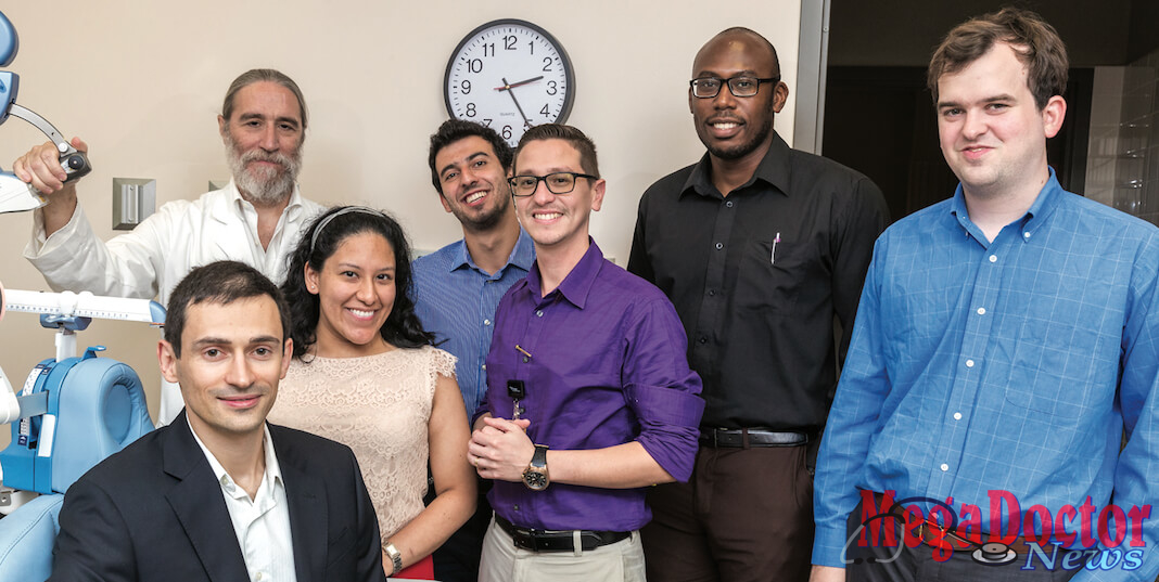 Dr. Gabriel De Erausquin (back row, at left), professor and founding chair of the UTRGV School of Medicine’s Department of Psychiatry, Neurology and Neurosciences, is shown here with the first cohort of UTRGV psychiatry residents: (front row, seated) Dr. Andry Shalomov, 35, American University of the Caribbean School of Medicine, Sint Maarten; (standing, middle row, from left) Dr. Lessley Chiriboa, 28, Rutgers University, Robert Wood Johnson Medical School; Dr. Karel de Leon, 34, Universidad Nacional Autónoma de México, Facultad de Medicina; Dr. Scott Wallace, 28, University of Arizona – Tucson College of Medicine; (back row, center) Dr. Camille Merhi, 25, University of Balamand, Faculty of Medicine and Medical Sciences, Lebanon; and Dr. Karachí Igwe, 29, St. George’s School of Medicine, Grenada. Mega Doctor News (UTRGV Photo by David Pike)