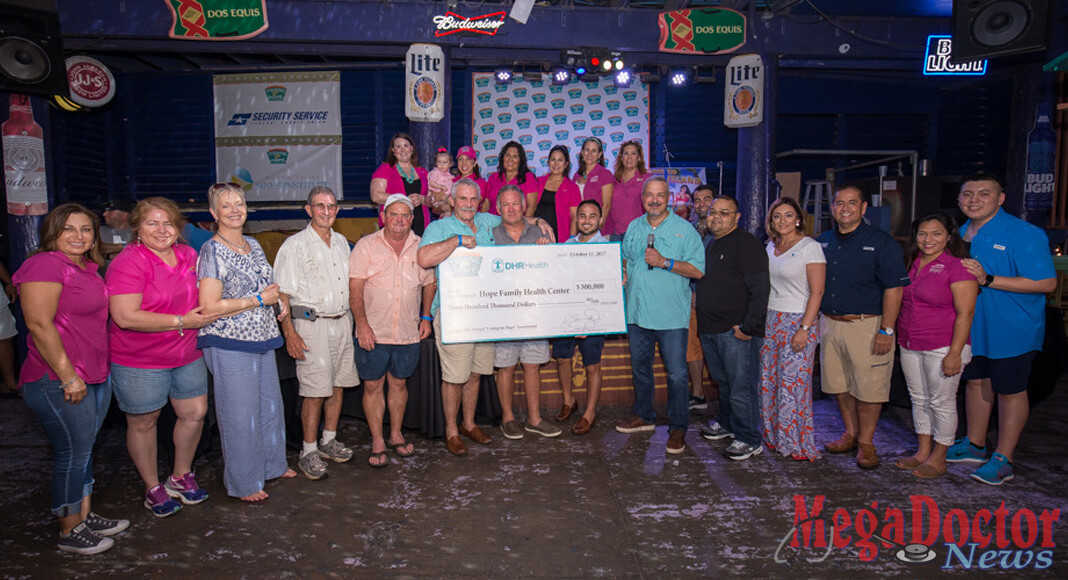 Pictured Above: DHR Health presents the Hope Family Health Center with a check for $300,000 at the 12th Annual “Fishing for Hope” Tournament in 2017.