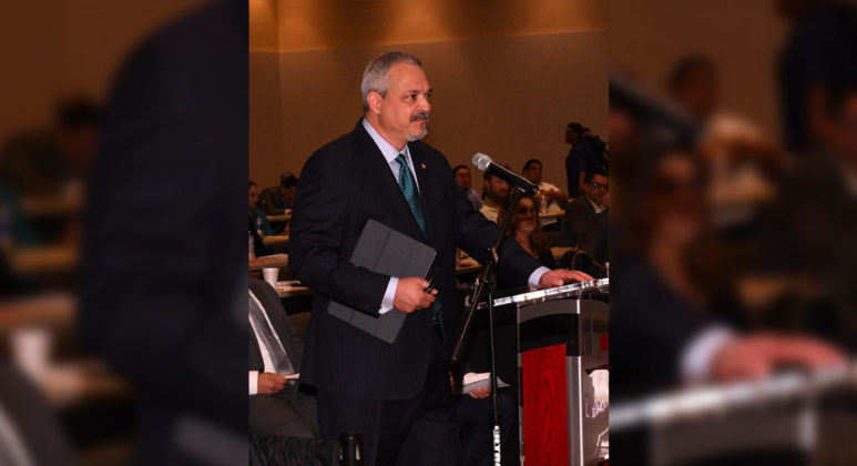 Dr. Carlos Cardenas as he delivers his testimony before the Humans Services committee. Photo by Roberto Hugo Gonzalez