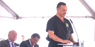Featured: Ambrosio Hernández, MD, Mayor of Pharr and the Chief Medical Compliance Officer, DHR Health, welcomes state, regional and local leaders, including Gov. Greg Abbott on Tuesday, September 18, 2018, to the grand opening and building dedication of the South Texas College Regional Center for Public Safety Excellence, located in his hometown. Sen. Juan "Chuy" Hinojosa, D-McAllen, and to Hinojosa's left, Sen. Eddie Lucio, Jr., D-Brownsville, were part of the delegation with the Pharr mayor during the ceremonies. Photograph By BENJAMIN BRIONES