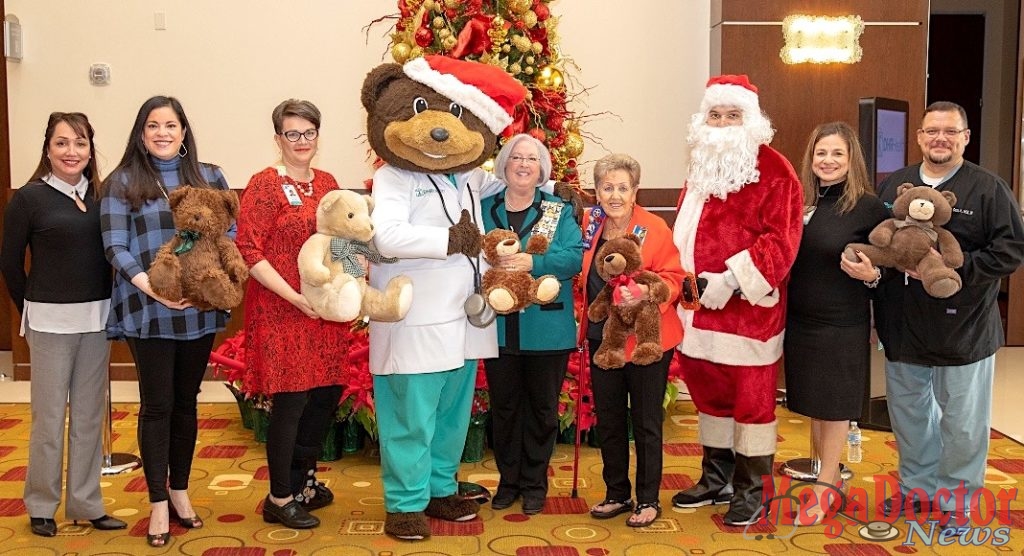 Pictured above: DHR Health receives a donation of teddy bears from Paula Owen and Irene Quail, representing the Rio Grande Chapter National Society Daughters of the American Revolution. Pictured from left to right: Norma Teran, DNP, MBA, RN, Chief Nursing Officer, DHR Health; Elizabeth Adamson, DNP-HI, MSN, RN, BC, Chief Nursing Information Officer, DHR Health; Lesley Anne Durant, JD, CHC, CHPC, Chief Compliance and Privacy Officer, DHR Health; Dr. Ted E. Bear; Paula Owen; Irene Quail; Lisa R. Treviño, PhD, Vice President for Research and Development; Mario Garza. Jr., MSN, RN, Vice President of Surgery and Procedural Services, DHR Health.  