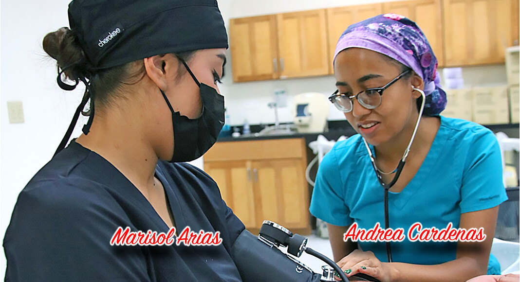 TSTC Dental Hygiene student Andrea Cardenas (right) uses a blood pressure cuff to monitor the vital signs and blood pressure of fellow classmate Marisol Arias during a recent lab session. (Photo courtesy of TSTC.)