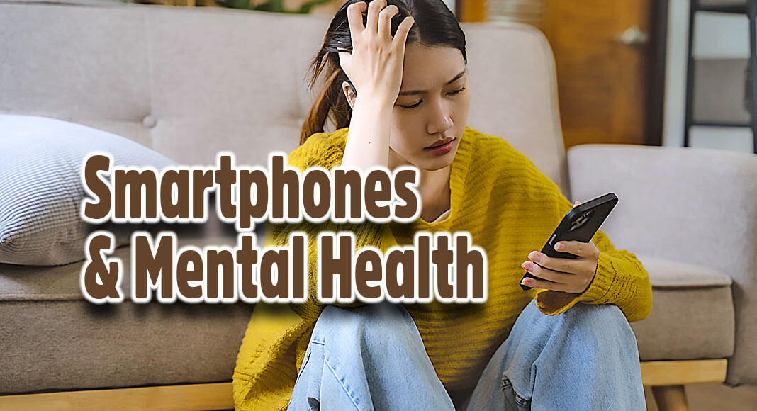 This Mental Health Awareness Month, one researcher explains why "unplugging" from your smartphone could improve your psychological well-being.  Image for illustration purposes