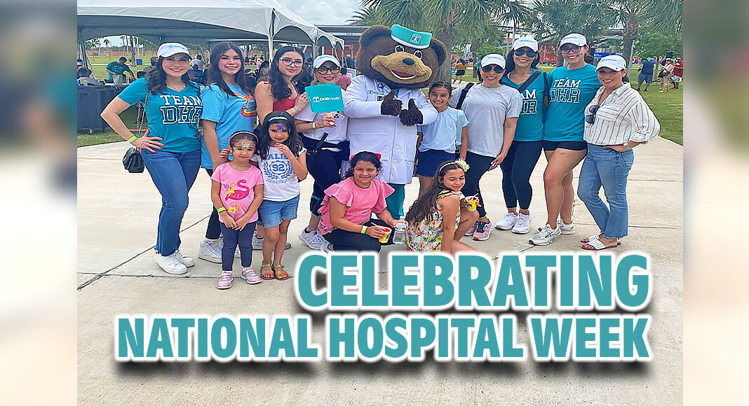 Pictured at the DHR Health National Hospital Week-Family celebration are employees, with their family members, and the DHR Health mascot, Dr. Ted E. Bear. The family event was held on May 20th at H-E-B Park, where employees enjoyed quality time with their loved ones in a fun-filled environment. Image courtesy of DHR Health