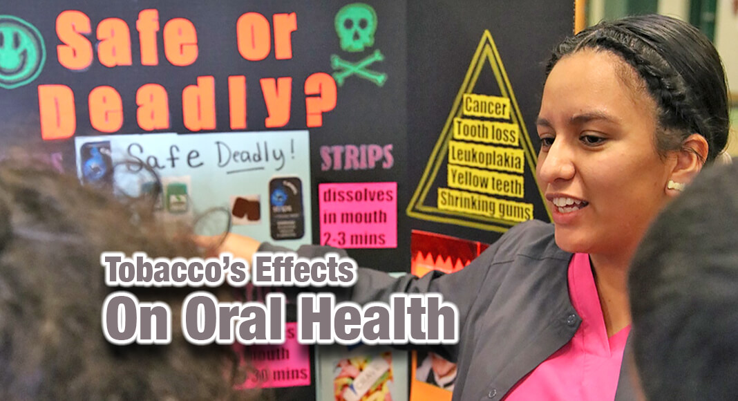 TSTC Dental Hygiene student Kristy Rocha (right) talks about the harmful effects of tobacco in a recent community outreach presentation to fifth grade students at Lyford Elementary School. (Photo courtesy of TSTC.)